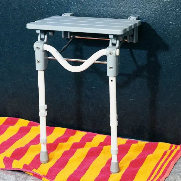 Duschklappsitz - mit Kunststoffsitz - Servoprax